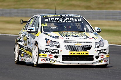Cameraman unhurt after car hits gantry in Snetterton crash