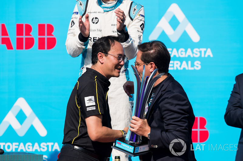 A team member from TECHEETAH, accepting the constructors trophy