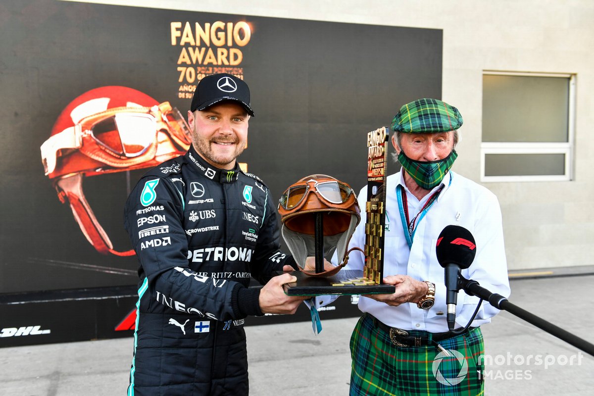 Sir Jackie Stewart presents pole man Valtteri Bottas, Mercedes, with the Fangio Award