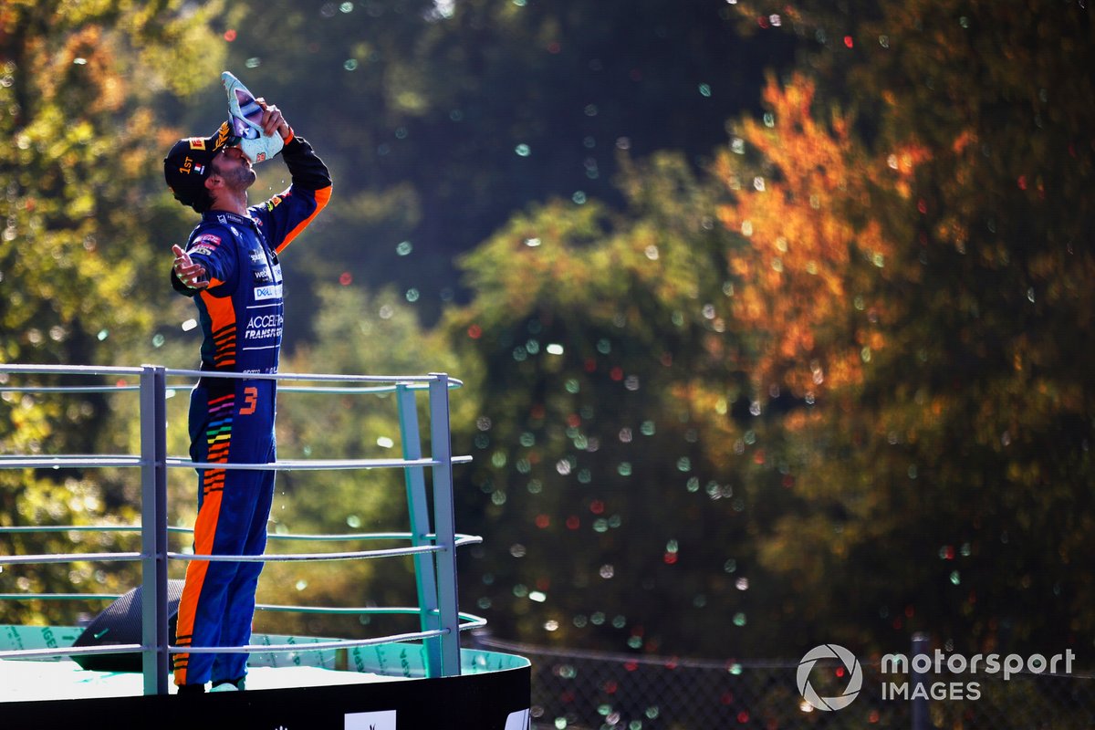 Daniel Ricciardo, McLaren, 1st position, does a shoey