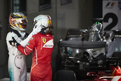 Sebastian Vettel, Ferrari, 1st Position, and Lewis Hamilton, Mercedes AMG, 2nd Position, congratulate each other in Parc Ferme