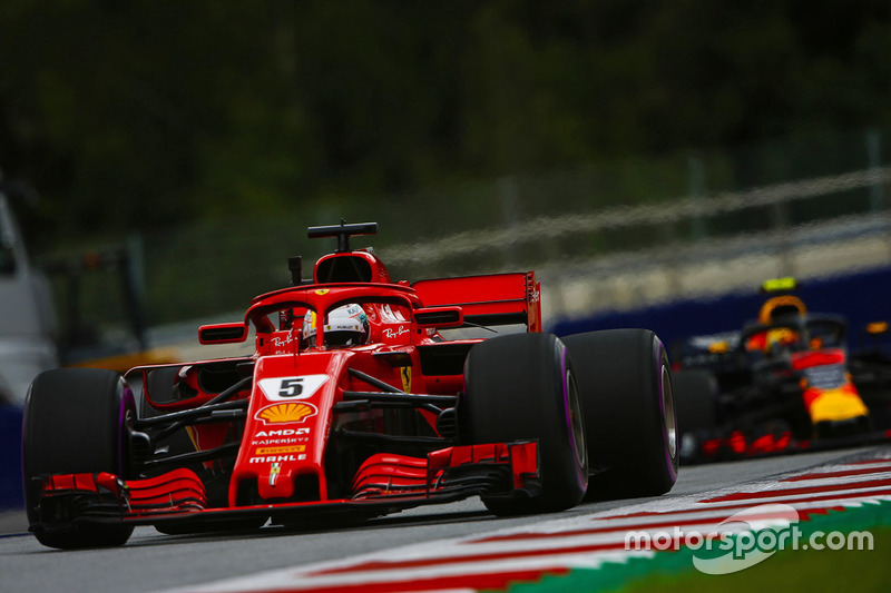 Sebastian Vettel, Ferrari SF71H, leads Max Verstappen, Red Bull Racing RB14