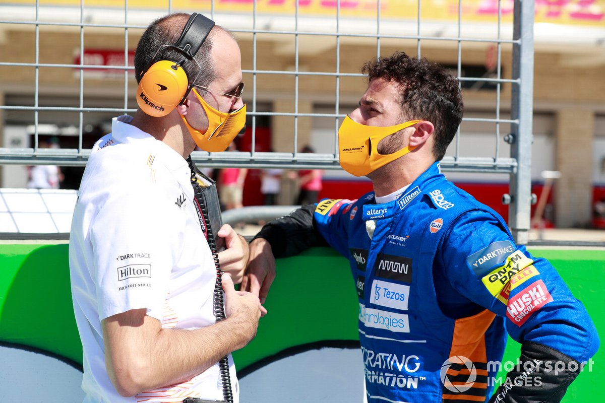 Daniel Ricciardo, McLaren, on the grid with his engineer