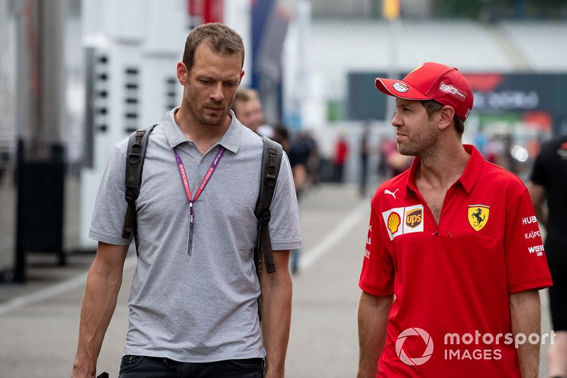 Alex Wurz with Sebastian Vettel, Ferrari