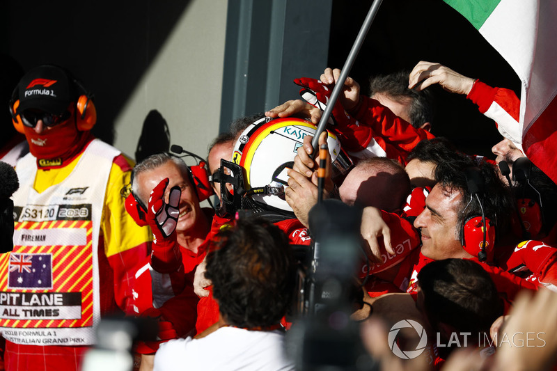 Race winner Sebastian Vettel, Ferrari, celebrates on arrival in Parc Ferme with his team