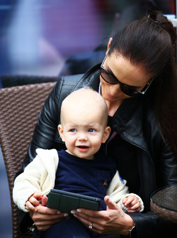 Minttu Virtanen, wife of Kimi Raikkonen Ferrari, with their baby son Robin