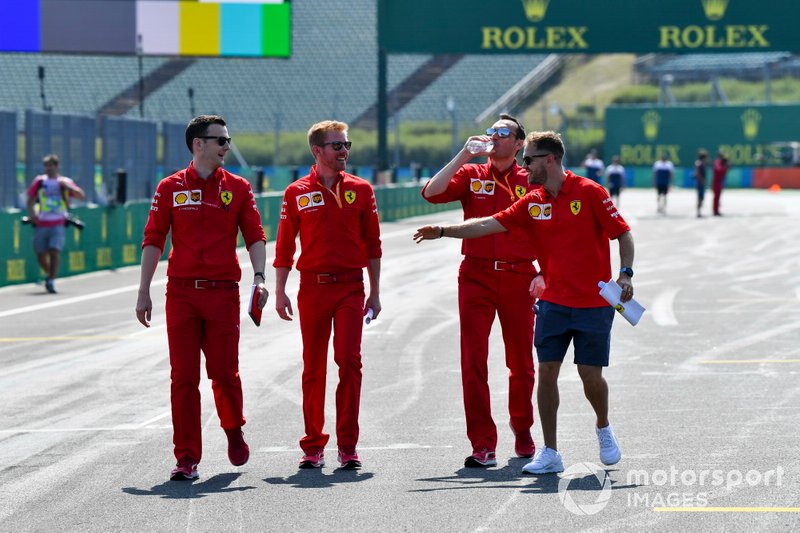 Sebastian Vettel, Ferrari walks the track with his team
