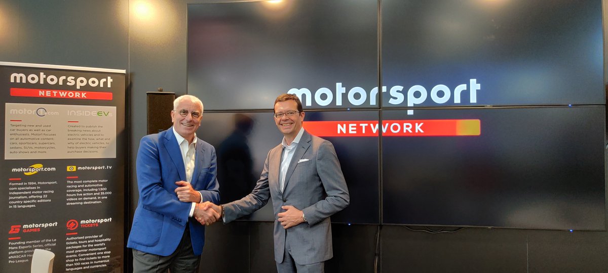 Pininfarina's CEO Silvio Pietro Angori shakes hands with the CEO of Motorsport Network Oliver Ciesla.