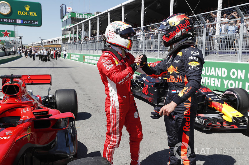 Pole sitter Sebastian Vettel, Ferrari and Max Verstappen, Red Bull Racing celebrate in parc ferme