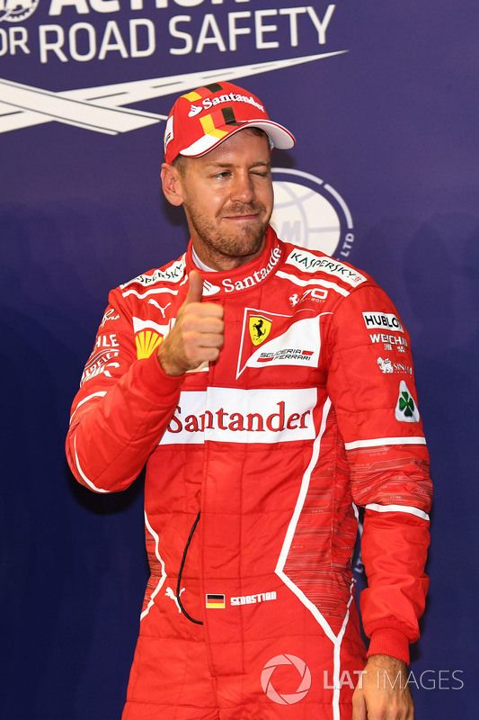 Pole sitter Sebastian Vettel, Ferrari celebrates in parc ferme