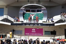 Race winner Lewis Hamilton, Mercedes AMG F1 celebrates on the podium alongside James Allison, Merced