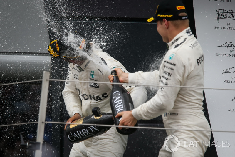 Race winner Lewis Hamilton, Mercedes AMG F1 and Valtteri Bottas, Mercedes AMG F1 celebrate on the podium