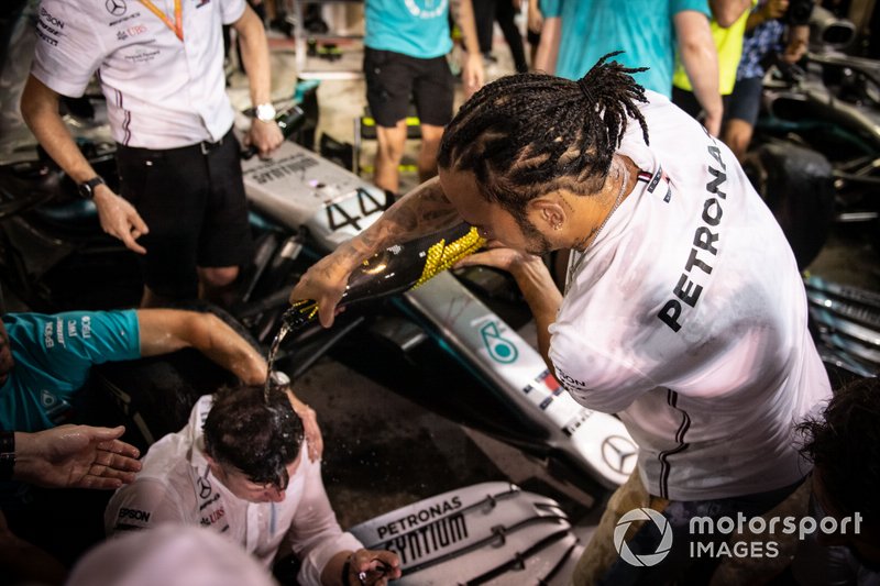 Lewis Hamilton celebrates his sixth world title with his Mercedes team