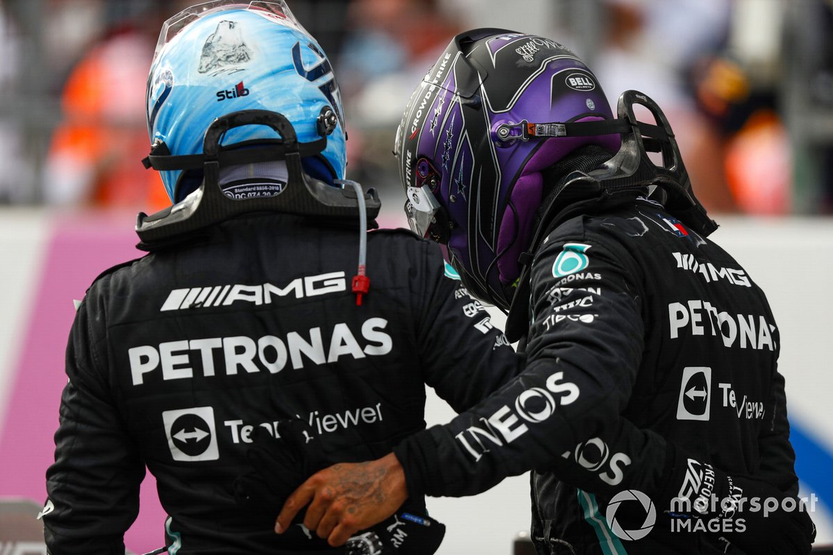 Lewis Hamilton, Mercedes, 2nd position, and Valtteri Bottas, Mercedes, 3rd position, congratulate each other in Parc Ferme