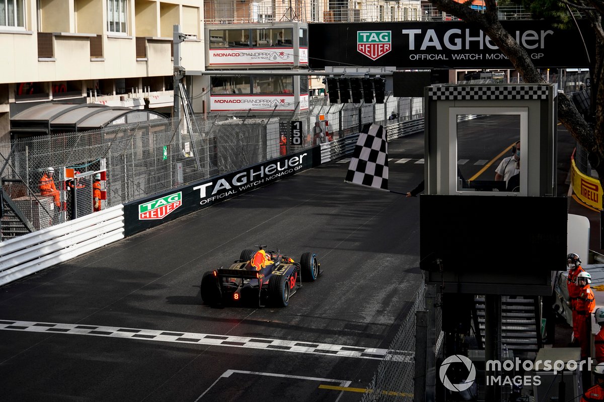 Liam Lawson, Hitech Grand Prix, takes the chequered flag