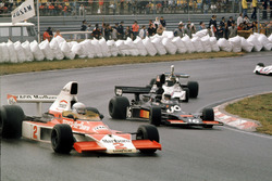 Jochen Mass,McLaren M23 Ford leads Tom Pryce, Shadow DN5A Ford