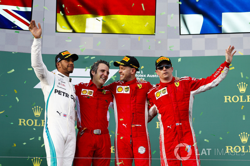 Lewis Hamilton, Mercedes AMG F1, 2nd position, Inaki Rueda, Race Strategist, Ferrari, Sebastian Vettel, Ferrari, 1st position, and Kimi Raikkonen, Ferrari, 3rd position, on the podium