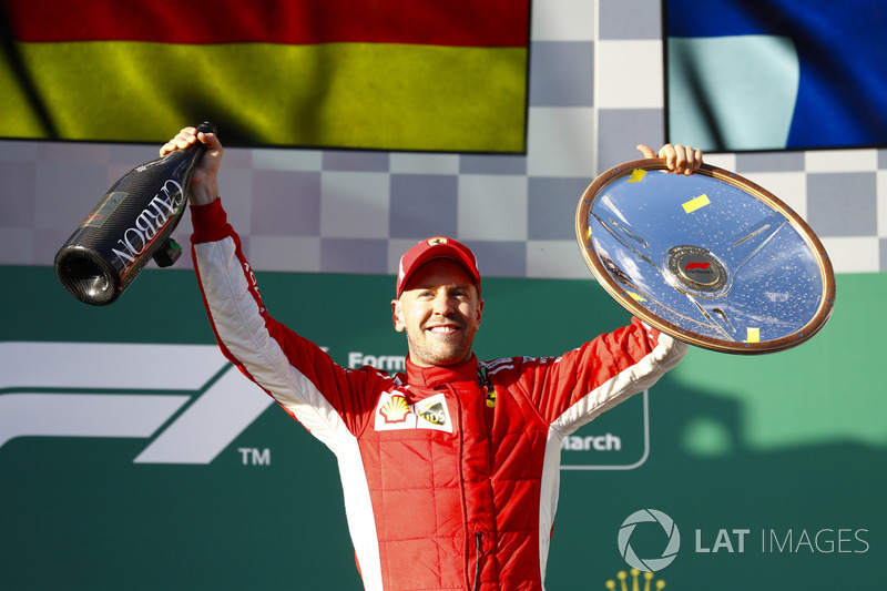 Sebastian Vettel, Ferrari, festeggia la vittoria sul podio