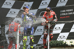 Подіум: друге місце Андреа Довіціозо, Ducati Team, переможець гонки Хорхе Лоренсо, Ducati Team, третє місце Валентино Россі, Yamaha Factory Racing