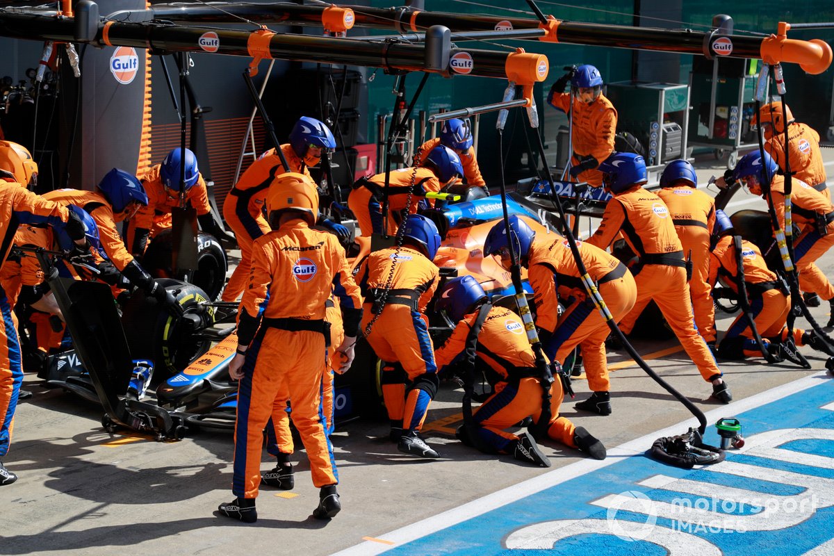 Lando Norris, McLaren MCL35M, makes a pit stop