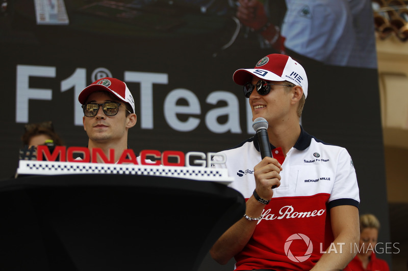 Charles Leclerc, Sauber and Marcus Ericsson, Sauber on stage