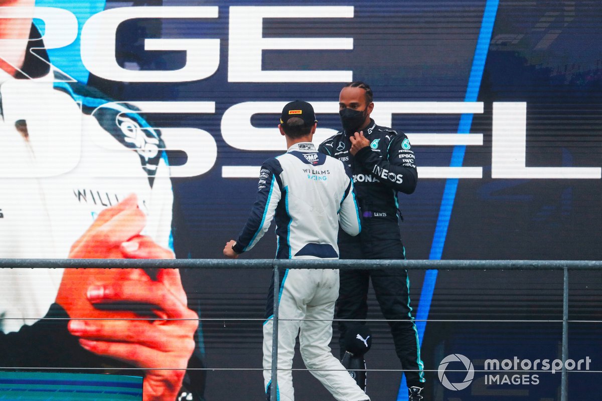 George Russell, Williams, dan Lewis Hamilton, Mercedes, saat berada di podium F1 GP Belgia 2021.