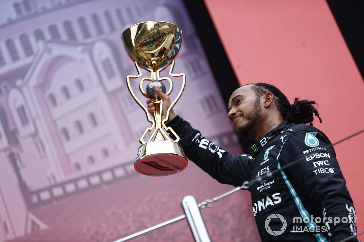 Lewis Hamilton, Mercedes, 1st position, with his trophy