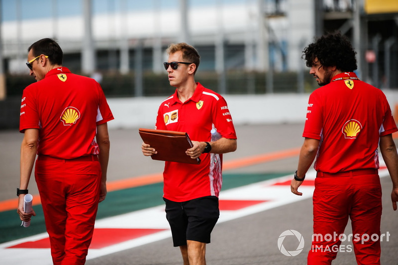 Sebastian Vettel, Ferrari, walks the track