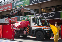 The Ferrari SF16-H of Kimi Raikkonen, Ferrari is recovered back to the pits on the back of a truck
