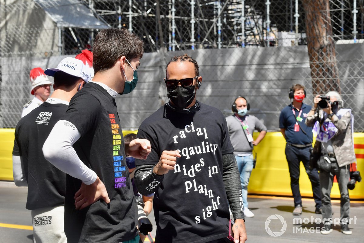Lance Stroll, Aston Martin, and Lewis Hamilton, Mercedes, on the grid