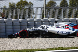 Lance Stroll, Williams FW41, drives into the gravel in FP1