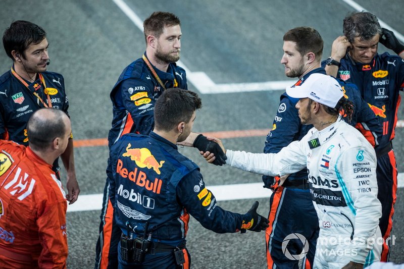 Lewis Hamilton, Mercedes AMG F1, 1st position, shakes hands with Red Bull mechanics at the end of the race