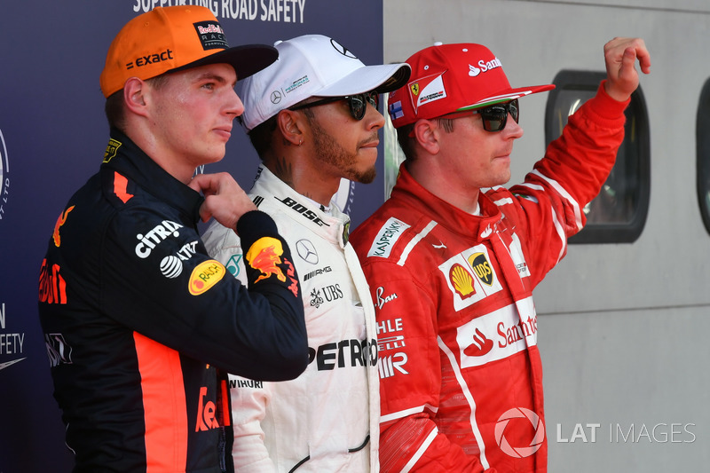 Max Verstappen, Red Bull Racing, pole sitter Lewis Hamilton, Mercedes AMG F1 and Kimi Raikkonen, Ferrari in parc ferme