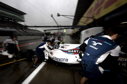 Lance Stroll, Williams FW40, is returned to the garage