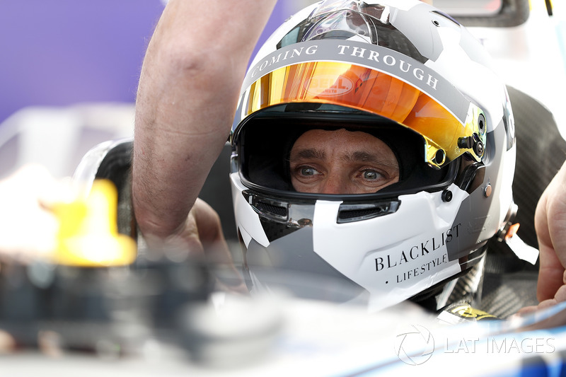 Jon Olsson, Alpine ski racer, prepares to go on track with the Formula E track car