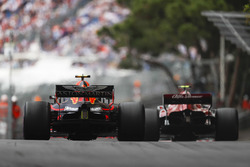 Charles Leclerc, Sauber C37, leads Max Verstappen, Red Bull Racing RB14