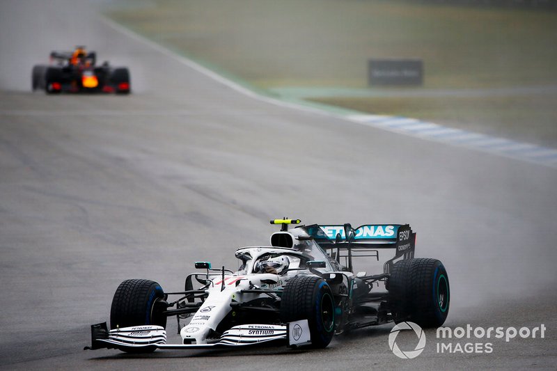 Valtteri Bottas, Mercedes AMG W10, leads Max Verstappen, Red Bull Racing RB15