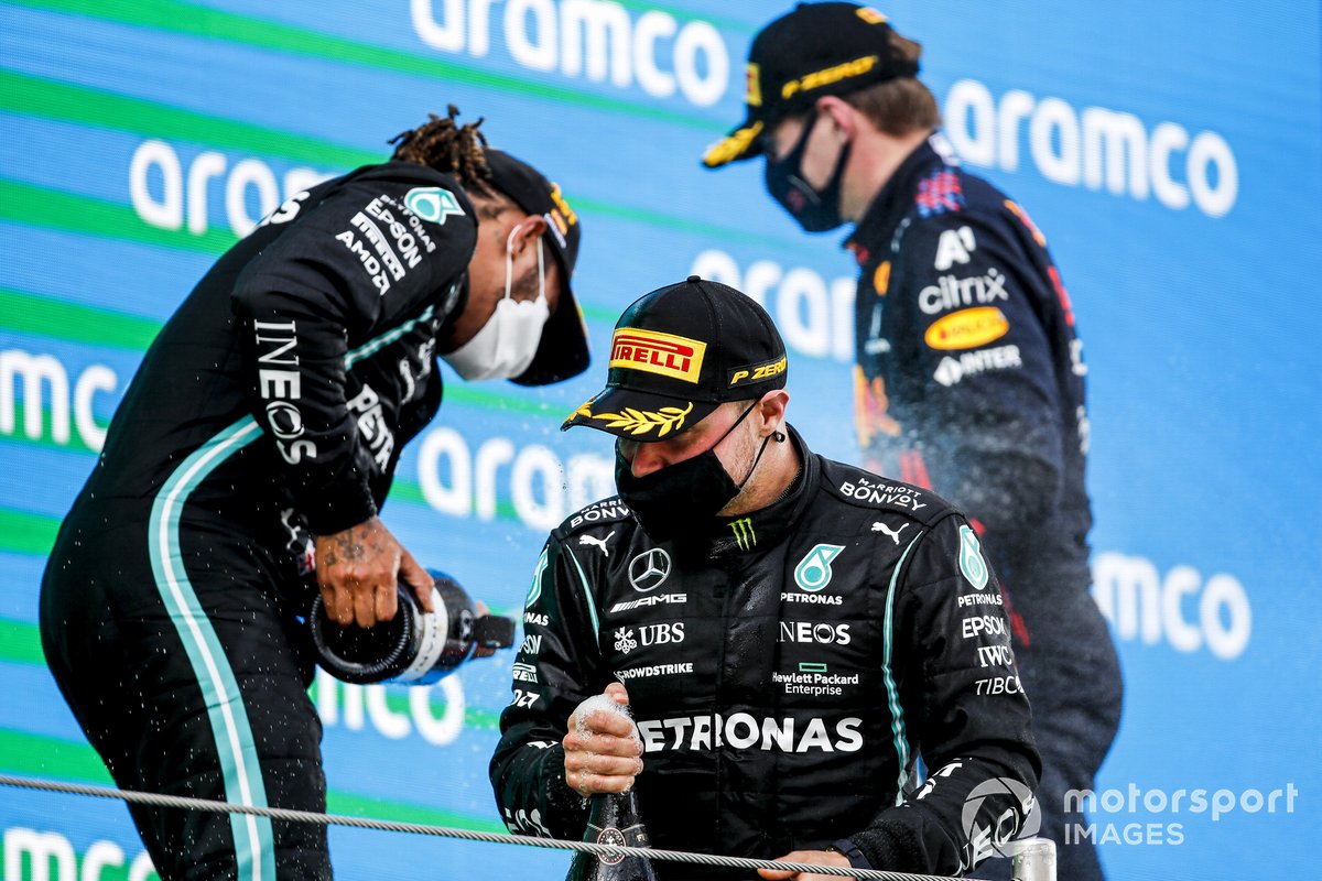 Valtteri Bottas, Mercedes, Race Winner Lewis Hamilton, Mercedes and Max Verstappen, Red Bull Racing celebrate on the podium with the champagne