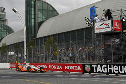 Josef Newgarden, Team Penske Chevrolet crosses the finish line under the checkered flag for the win
