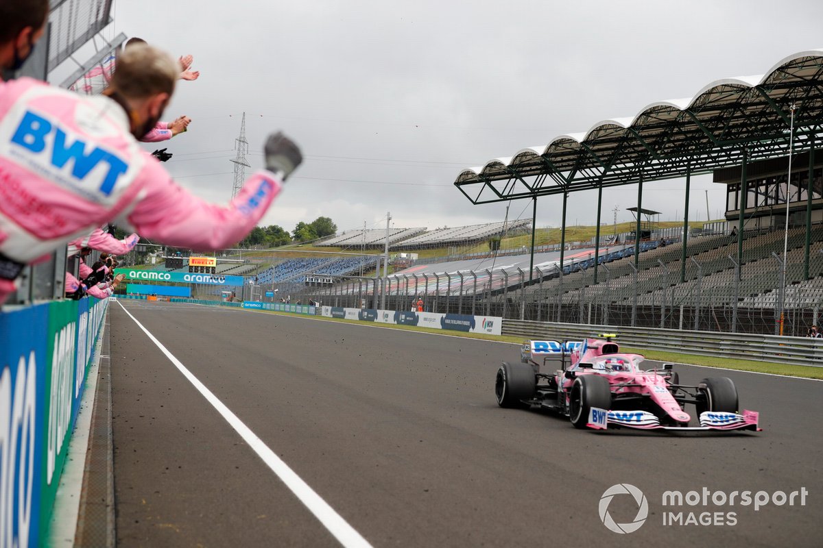 Lance Stroll, Racing Point RP20, is congratulated by mechanics