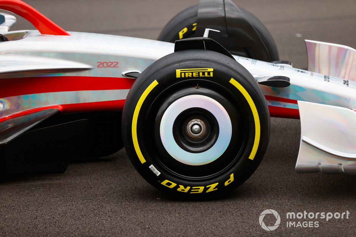 The 2022 Formula 1 car launch event on the Silverstone grid. Nose and front wheel detail