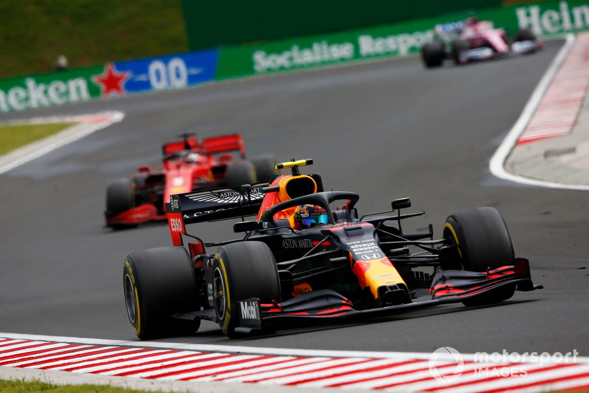 Alex Albon, Red Bull Racing RB16, leads Sebastian Vettel, Ferrari SF1000