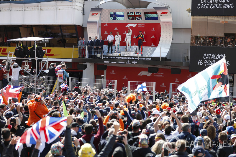 Lewis Hamilton, Mercedes AMG F1, Valtteri Bottas, Mercedes AMG F1 and Max Verstappen, Red Bull Racing, celebrate on the podium in front of fans