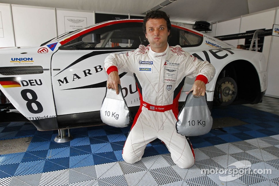 Darren Turner with penalty weight