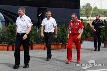 Ross Brawn, Mercedes AMG F1 Team Principal; Martin Whitmarsh, McLaren Chief Executive Officer; Stefano Domenicali, Ferrari General Director; and Eric Boullier, Lotus F1 Team Principal leave a meeting with Bernie Ecclestone, CEO Formula One Group