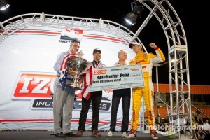 IndyCar Series 2012 champion Ryan Hunter-Reay, Andretti Autosport Chevrolet is presented with his championship check, with Michael Andretti and Chief Executive Officer of IndyCar Randy Bernard
