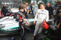 Sebastian Vettel, Red Bull Racing and Michael Schumacher, Mercedes GP