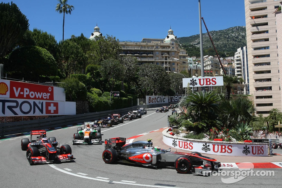 Sergio Perez, McLaren MP4-28 and Jenson Button, McLaren MP4-28
