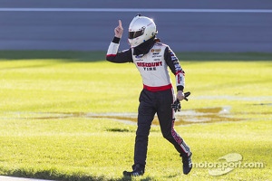 Brad Keselowski pointing with anger as Kyle Busch drives by after the crash in Kansas Nationwide race
