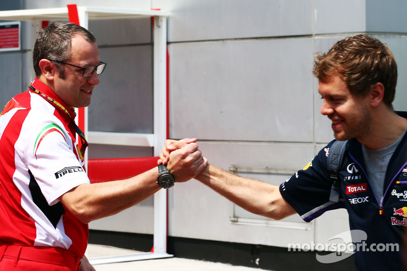 (L to R): Stefano Domenicali, Ferrari General Director with Sebastian Vettel, Red Bull Racing